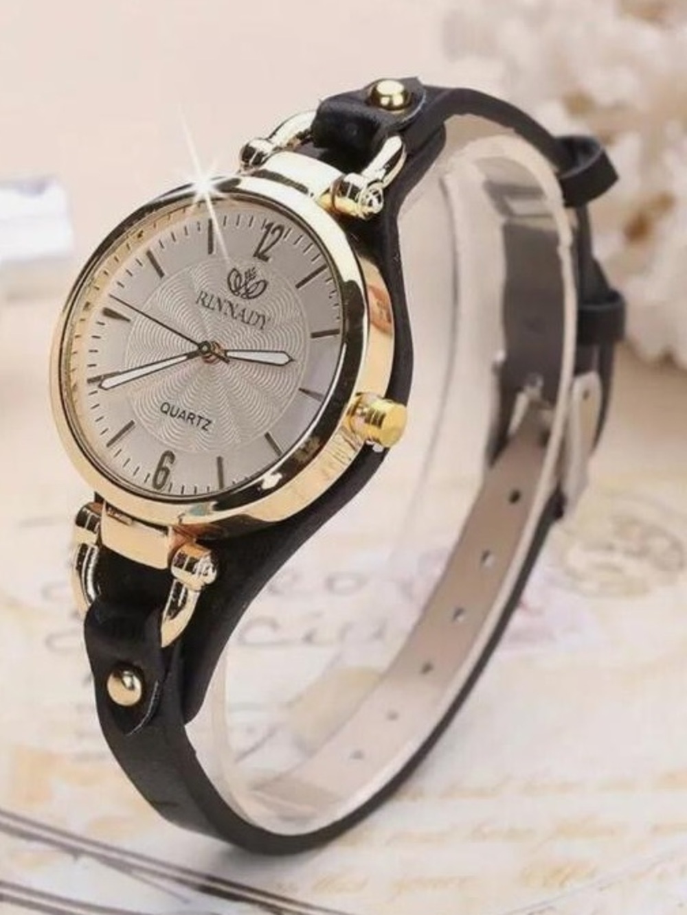 Anthropologie Black and Gold Round Dial Leather Strap Watch